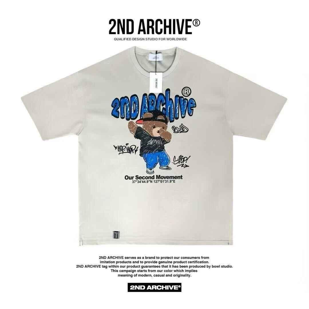 Beige graphic T-shirt with cartoon bear in hip hop outfit, blue &