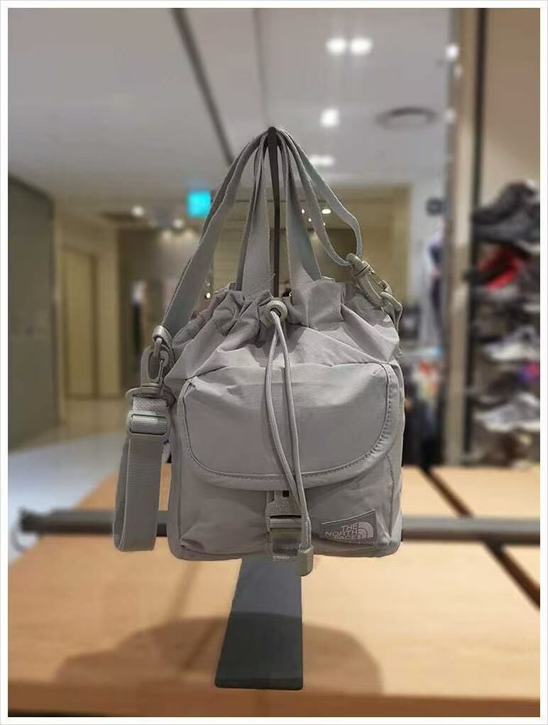 TNF BREEZE BUCKET BAG - HLY & CHOCCICO