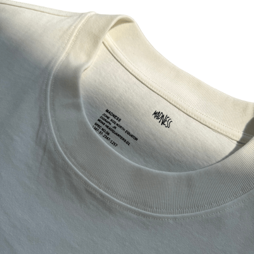 MADNESS BADGE (L) UNIFORM Tee - HLY & CHOCCICO