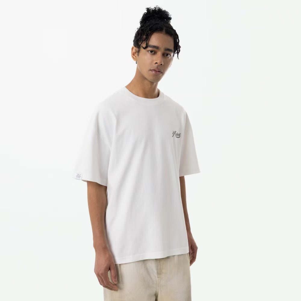 MADNESS BADGE (L) UNIFORM Tee - HLY & CHOCCICO