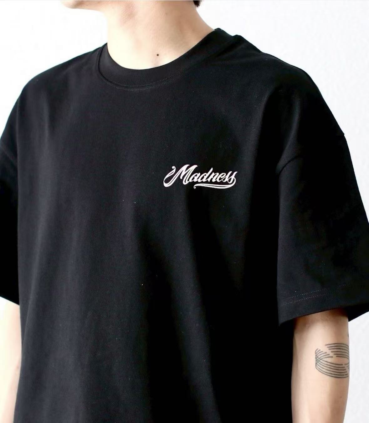 MADNESS BADGE (L) UNIFORM Tee - HLY & CHOCCICO