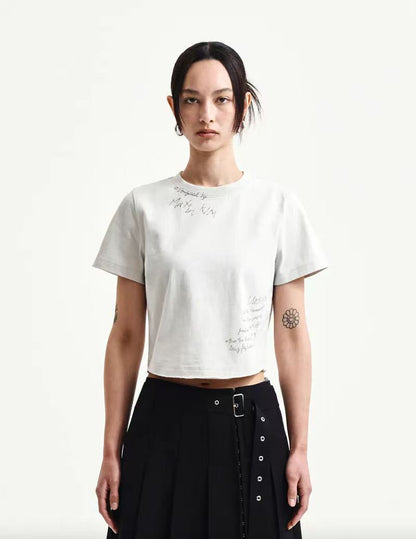 Matin Kim Graffiti Round Hem Crop Tee