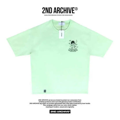 Light green short sleeve tee with cartoon teddy bear graphic and text, 2nd Archive tag visible.
