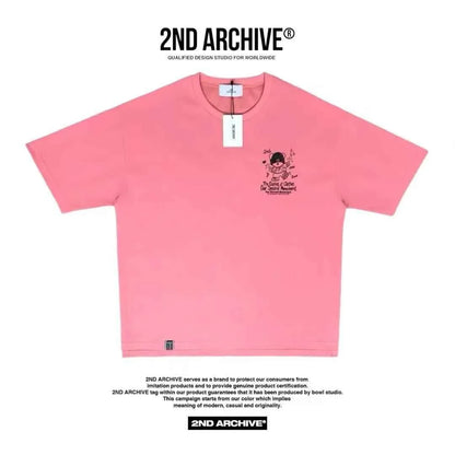 Pink short-sleeve t-shirt with teddy bear and text graphic on chest, 2ND ARCHIVE tag attached.