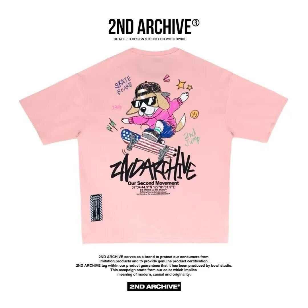 Pink t-shirt featuring cartoon beagle skateboarding, bold 2ND ARCHIVE text and playful graphics.
