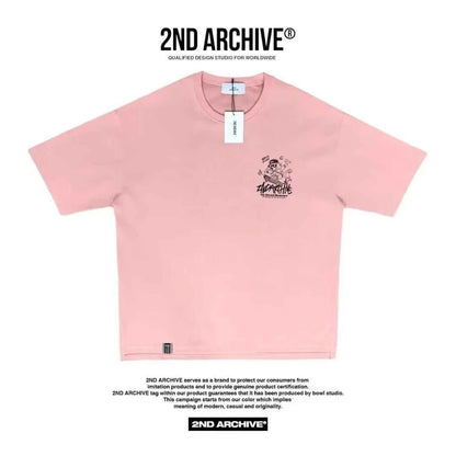 Pink short sleeve T-shirt with black graphic and text on the chest, 2ND ARCHIVE tag visible.