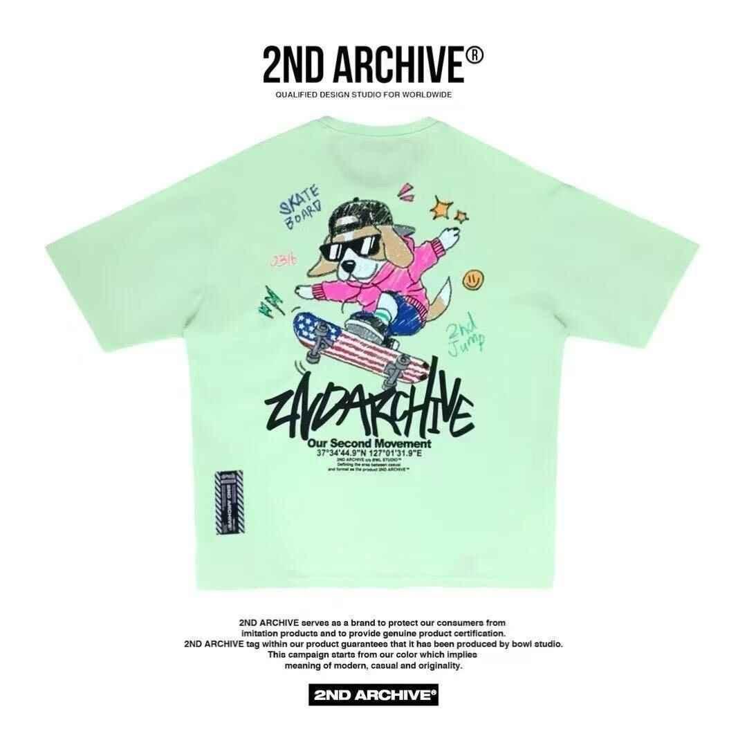 Light green tee with cartoon dog skateboarding, bold &