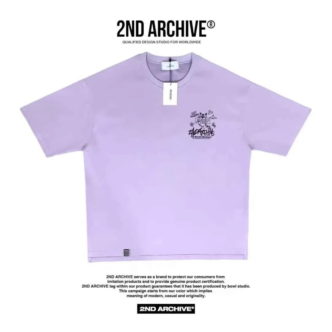 Light purple oversized T-shirt with black cat cartoon and graffiti print on chest, casual style.
