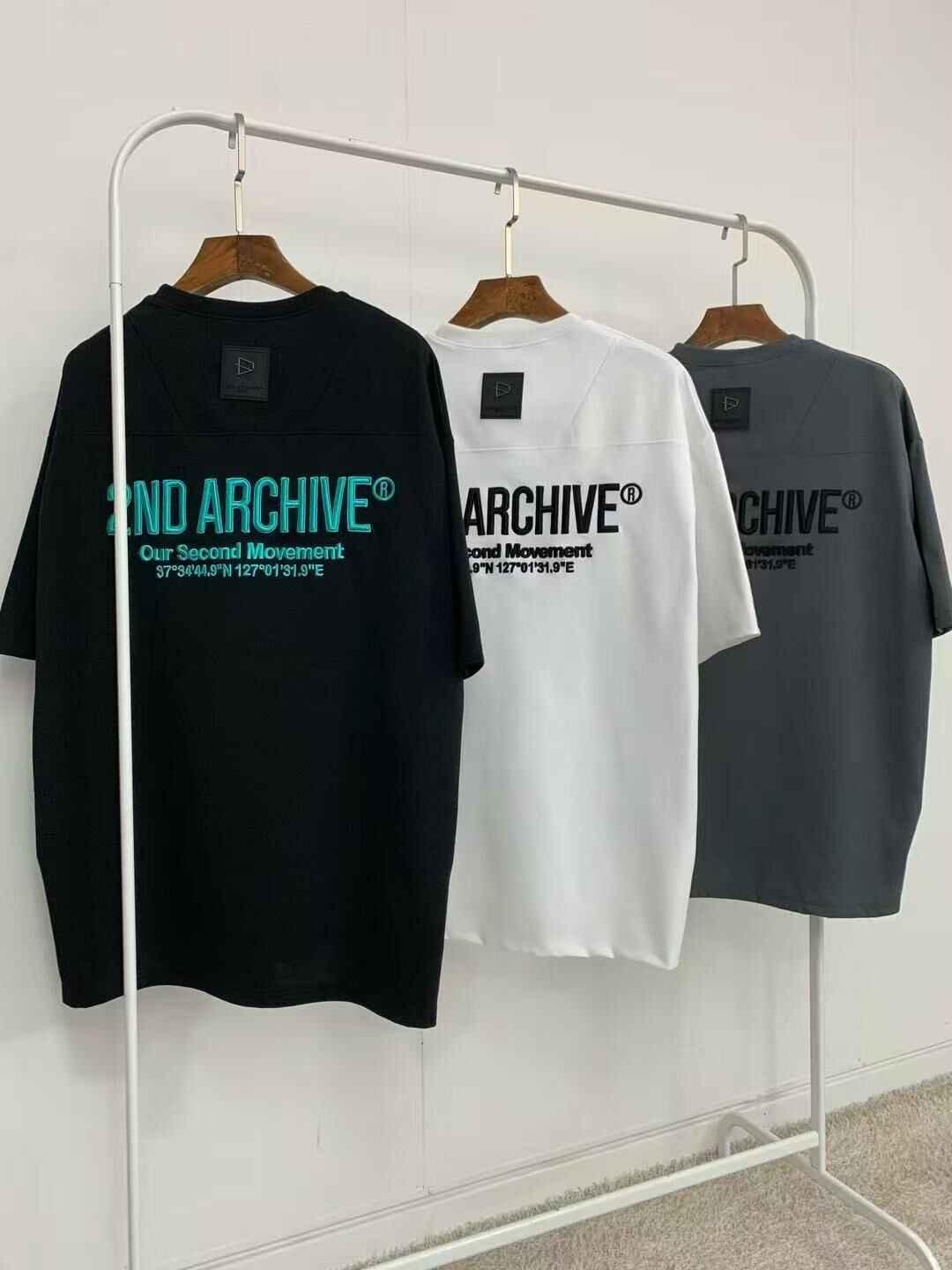 Three oversized short sleeve tees in black, white, and gray with &