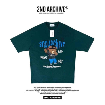 Deep green oversized T-shirt with blue 2ND ARCHIVE graffiti logo and cartoon bear graphic.
