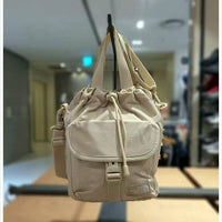 TNF BREEZE BUCKET BAG - HLY & CHOCCICO