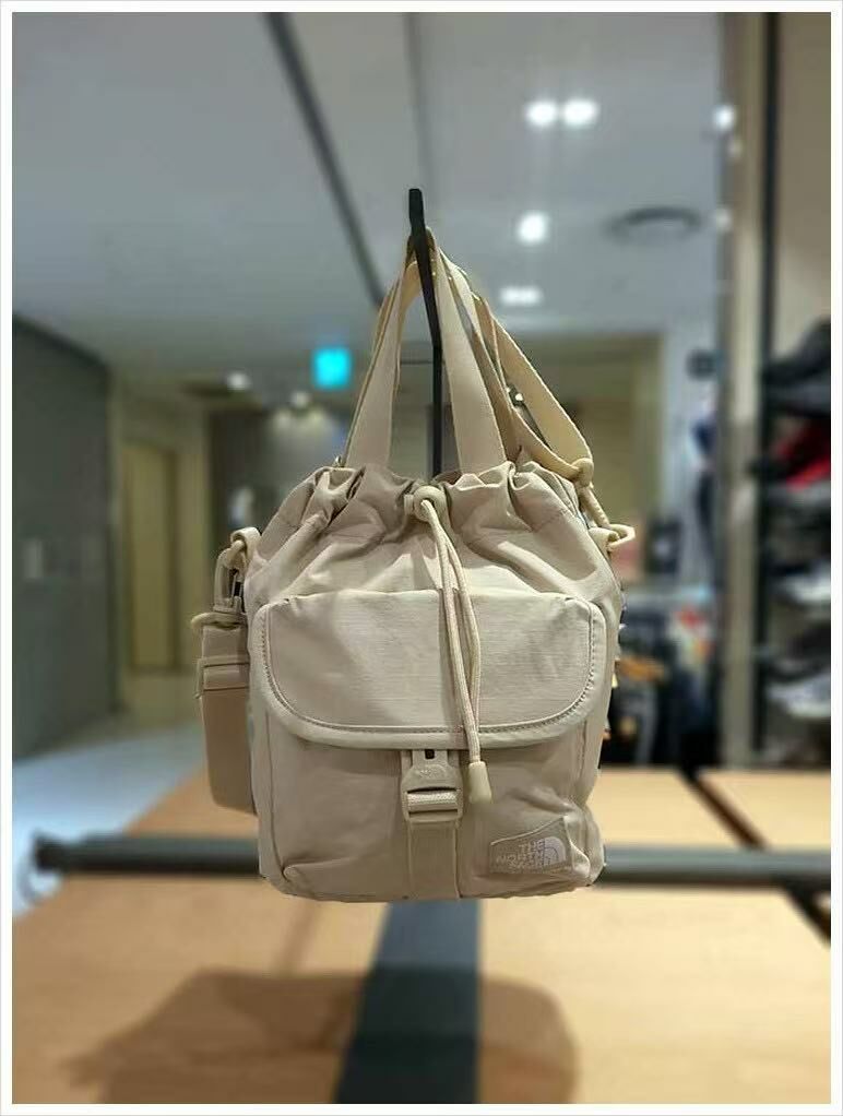 TNF BREEZE BUCKET BAG - HLY & CHOCCICO