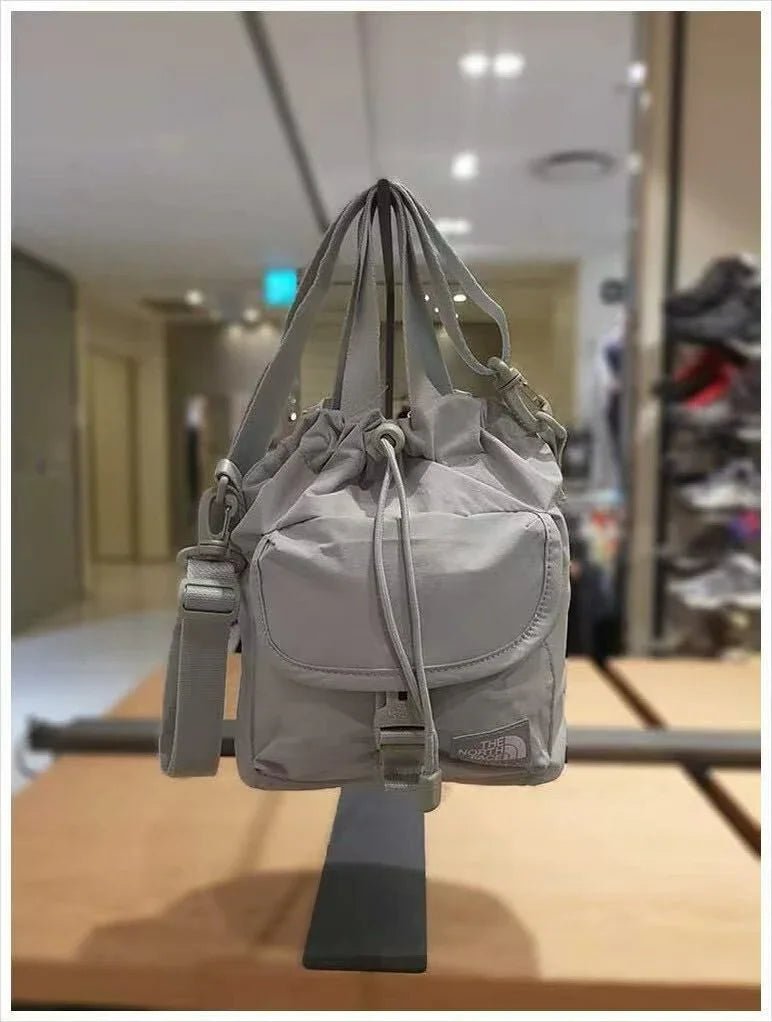 TNF BREEZE BUCKET BAG - HLY &amp; CHOCCICO